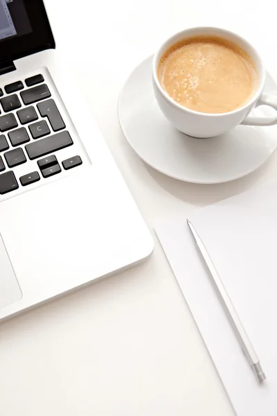 Work desk interior with a laptop computer