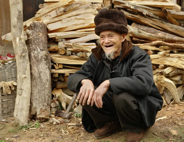 Yao old Men Dazhai China. GUANGXI PROVINCE, CHINA - APRIL 3: Yao ethnic old Men, Yao village Dazhai, Southwest China, April 3, 2010. An elderly Chinese man, Dazhai, near Longsheng, Guangxi, China.