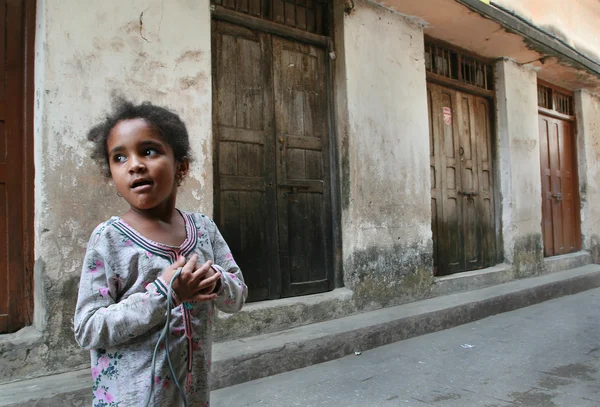 Dark-skinned African Muslim girl 10 years old, Tanzania, Zanzibar island.