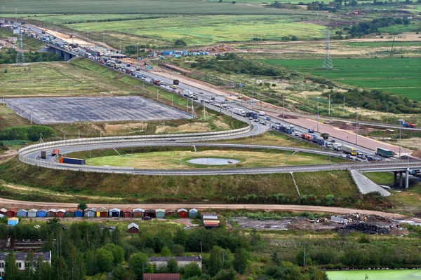 Vehicular traffic on ring road around St. Petersburg, Russia.