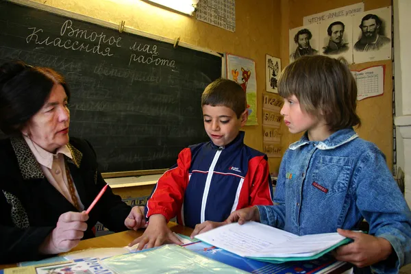 School Class In The Russian Village School, A School Teacher Communicates With Students.