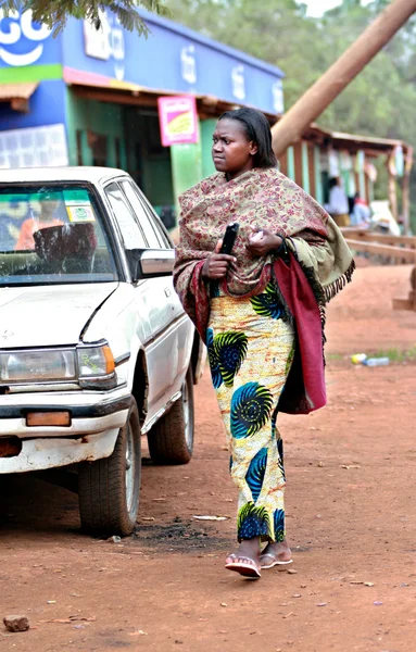 African black woman dressed in ponchos and colorful dress