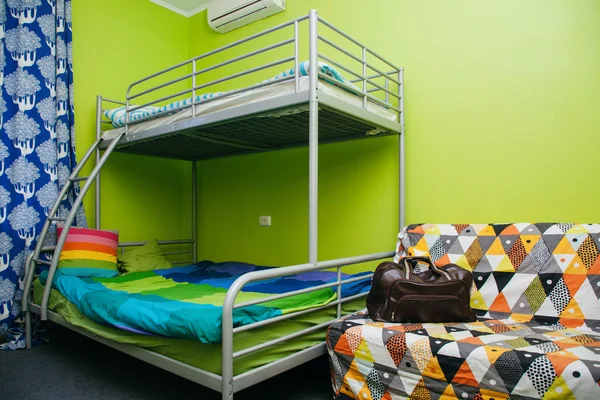Hostel room with city view. Color room. Bright interior