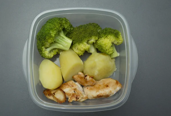 Healthy meal in tupperware container
