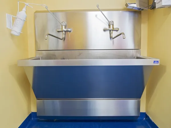 Metal sink in hospital room