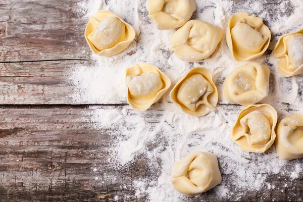 Pasta ravioli on flour