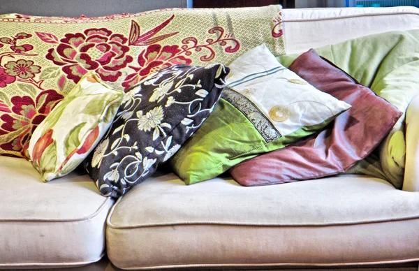 Stack of cushions on sofa