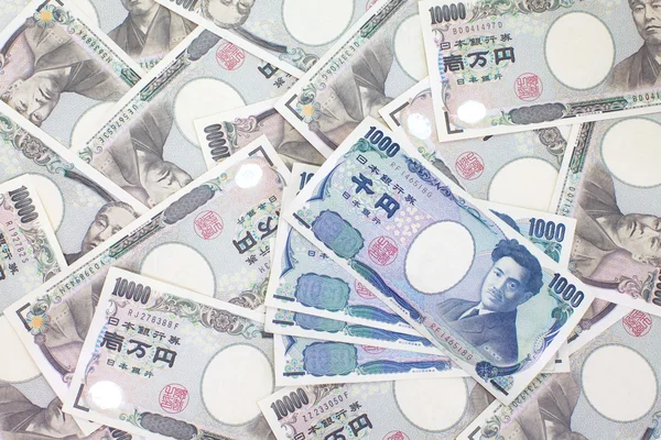 Close - up Japanese currency yen , bank notes and coins