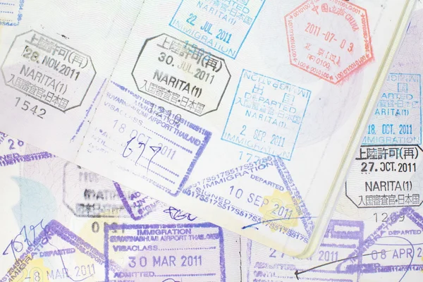 Immigration arrival stamps on passport