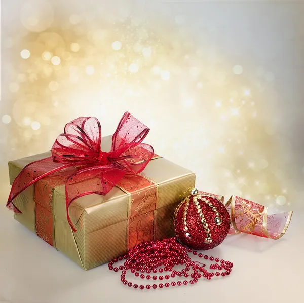 Christmas Gift Box and Decorations in Gold and Red