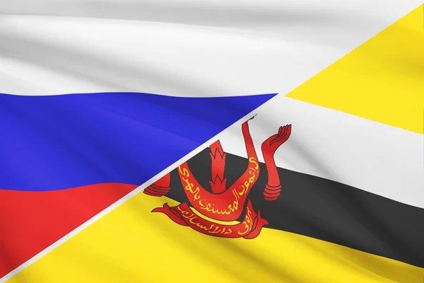 Series of ruffled flags. Russia and Brunei.