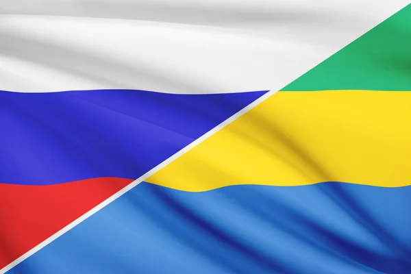 Series of ruffled flags. Russia and Gabonese Republic.