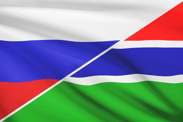 Series of ruffled flags. Russia and Republic of the Gambia.