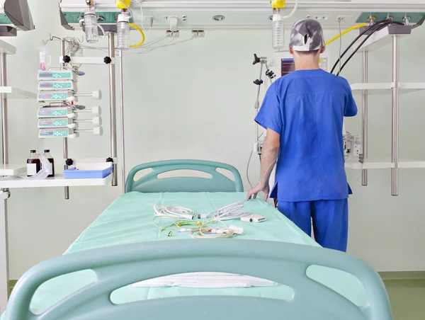 Doctor prepare place in an advanced, modern intensive care unit