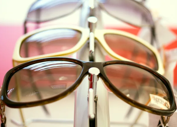 Sunglasses.close up shades and sunglasses in optician's shop