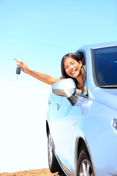 Car woman showing keys