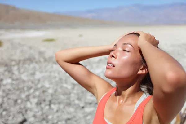 Desert woman thirsty dehydrated in Death Valley