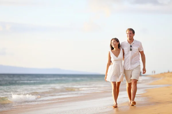 Couple walking on beach