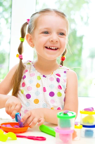 Child Playing with Play Dough