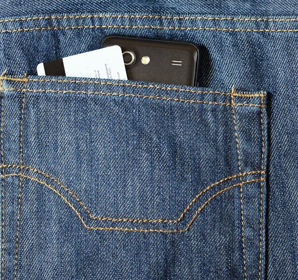 Phone and credit card in a pocket