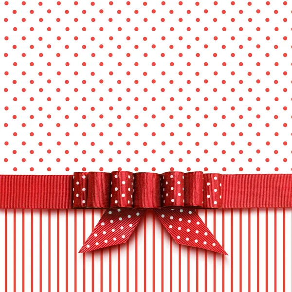 Bow on red and white background