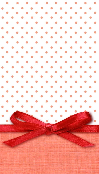 Bow on red and white background