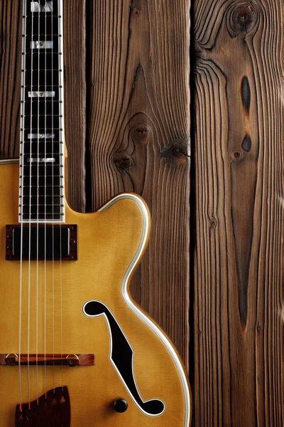 Jazz guitar on aged wood