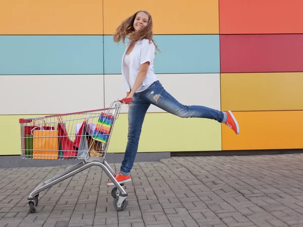 Girl with shopping trolley