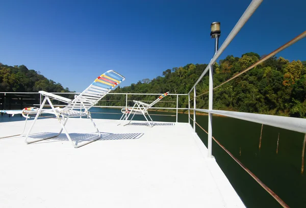 Resting chair on top of houseboat