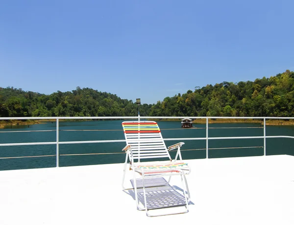Resting chair on top of houseboat