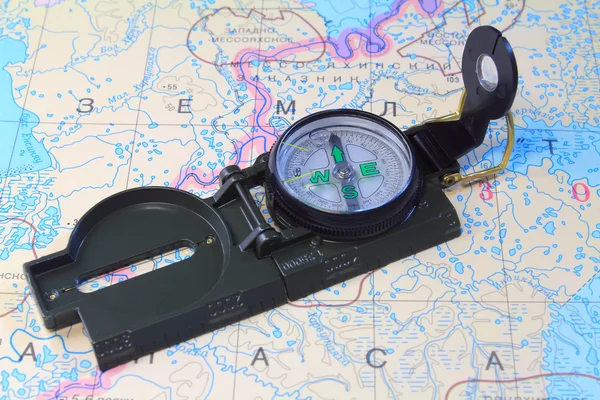 A compass and a map of the North of Russia