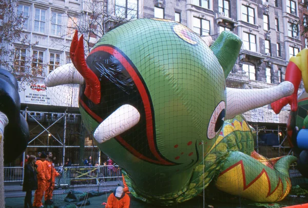 NEW YORK-NOV 21: On the day before the 2012 Macy\'s Thanksgiving Day Parade, all of the giant balloons are inflated with helium. Pictured here is the Flying Dragon balloon.