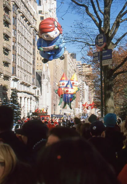 NEW YORK-NOV 22: A holiday tradition since 1924, the annual Macy\'s Thanksgiving Day Parade is seen by more than 3.5 million people. Pictured here in 2012 are the Virginia and Elves balloons.