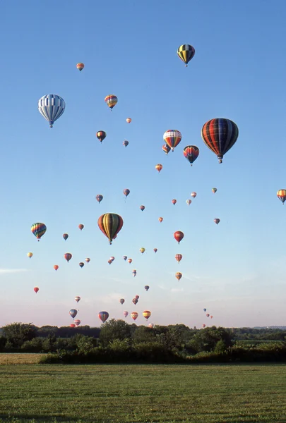 SOLBERG AIRPORT-READINGTON, NEW JERSEY,USA-JULY 17: Pictured are some of the many hot air balloons that flew at the 1987 New Jersey Festival of Hot Air Ballooning.