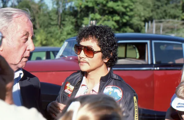 BRANCHBURG, NEW JERSEY, USA-SEPTEMBER 13: Well known balloonist and adventurer, Rocky Aoki (right), founder of Benihana restaurants, is pictured at the 1986 Somerset County Hot Air Balloon Festival.