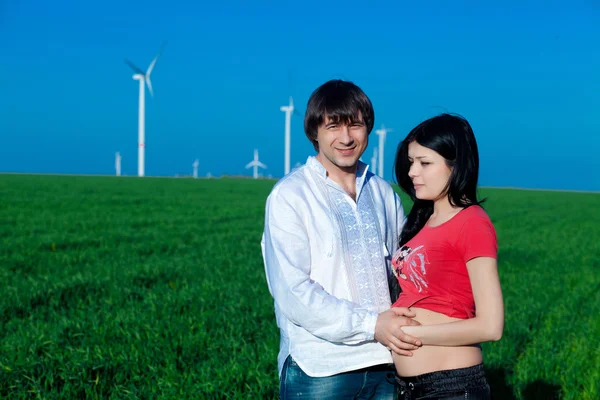 Young family near the power generators