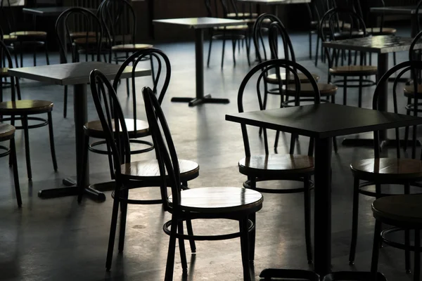 Tables and chairs in a cafeteria
