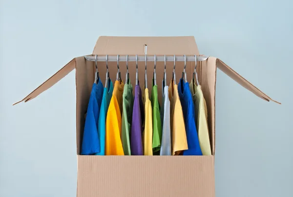 Bright clothing in a wardrobe box for easy moving