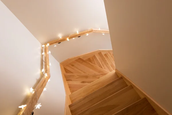 Lights decorating wooden staircase