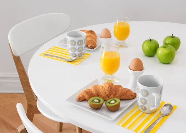 White table with healthy breakfast