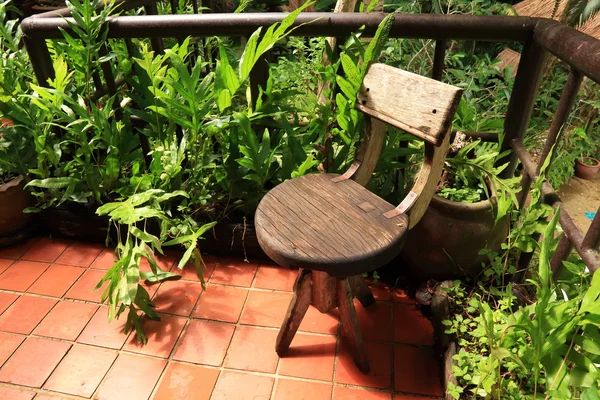 Wooden Vintage Chair at Balcony.