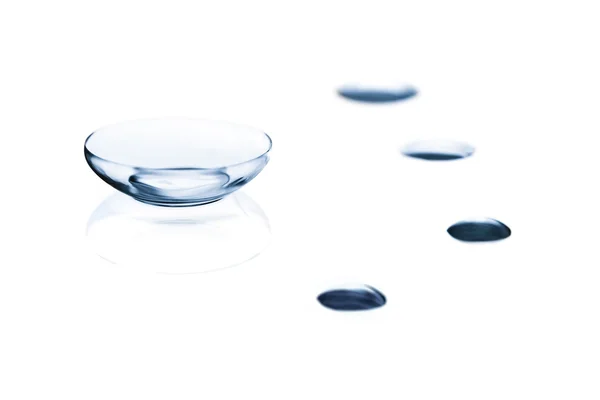 Contact Lens and Water Drops on Glass