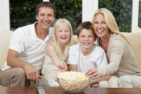 Happy Family Eating Popcorn Watching Television