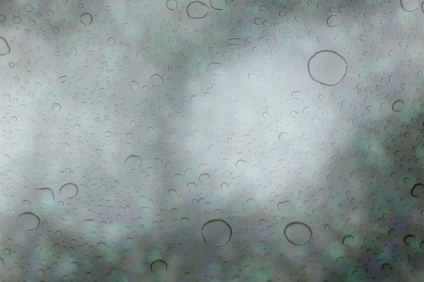 Abstract background with raindrops and colored bokeh