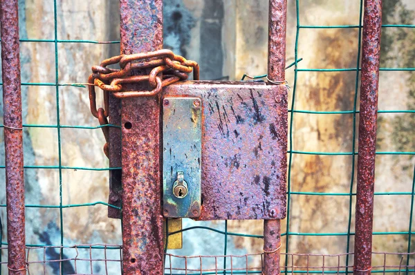 Gate closed with lock and chains