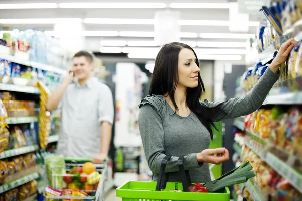 Couple at supermarket