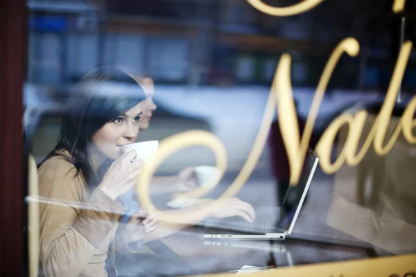 Young woman in coffee shop