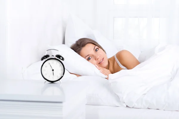 Woman in bed waking up — Stock Photo #21901821
