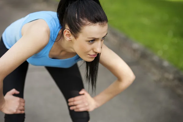 Tired woman after jogging