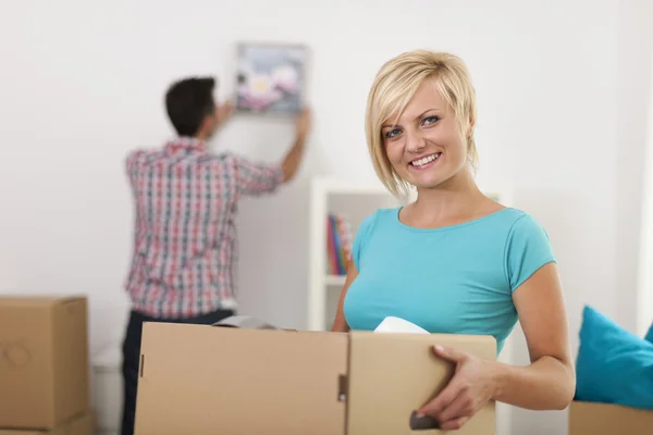 Woman moving home